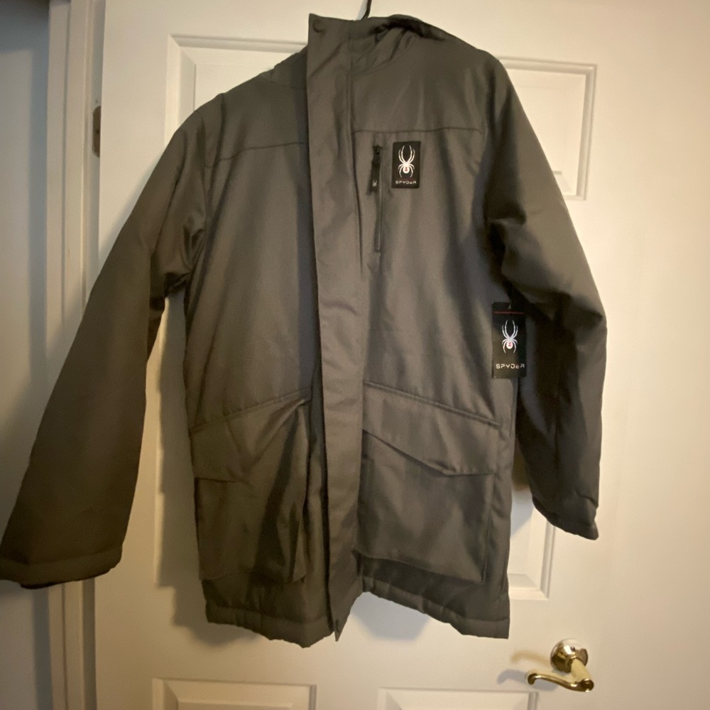 Spyder Coat with hood. Size small. New with tags. Grey